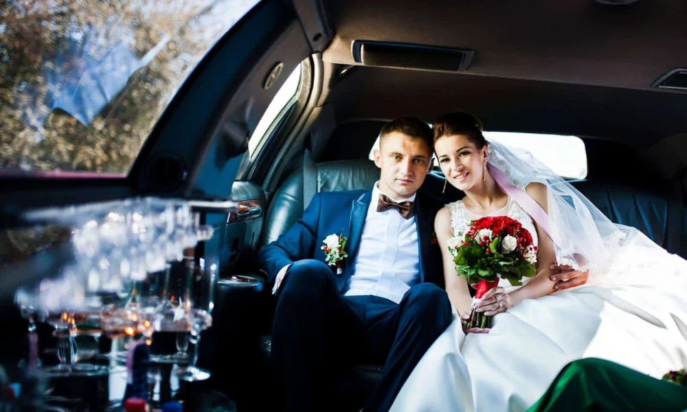 wedding in limo looking trendy
